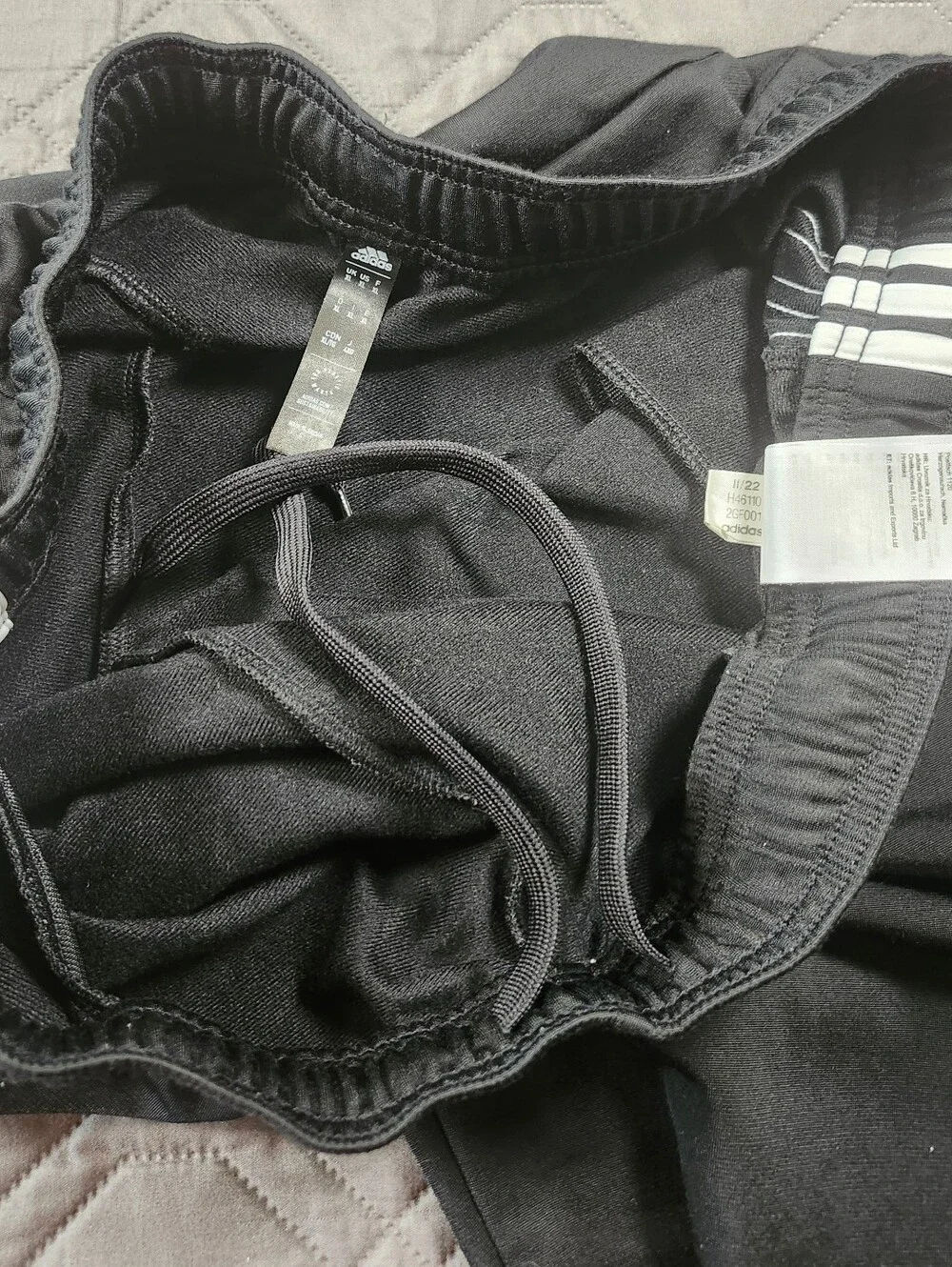 black Adidas activewear track pants white three-stripe detailing men's size XL